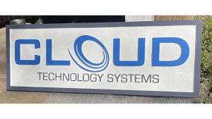 Rectangular HDU sign for Cloud Technology Systems with bold blue and gray raised lettering on a white textured background